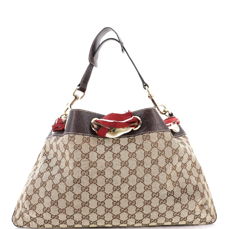 Women Gucci bags with interlocking G hardware for a classic lookPositano Tote GG Canvas Large