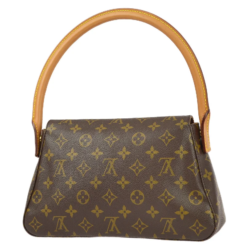 Louis Vuitton Alma bags with a monogram - embossed leather surfaceLouis Vuitton 2001 Monogram Mini Looping Handbag M51147