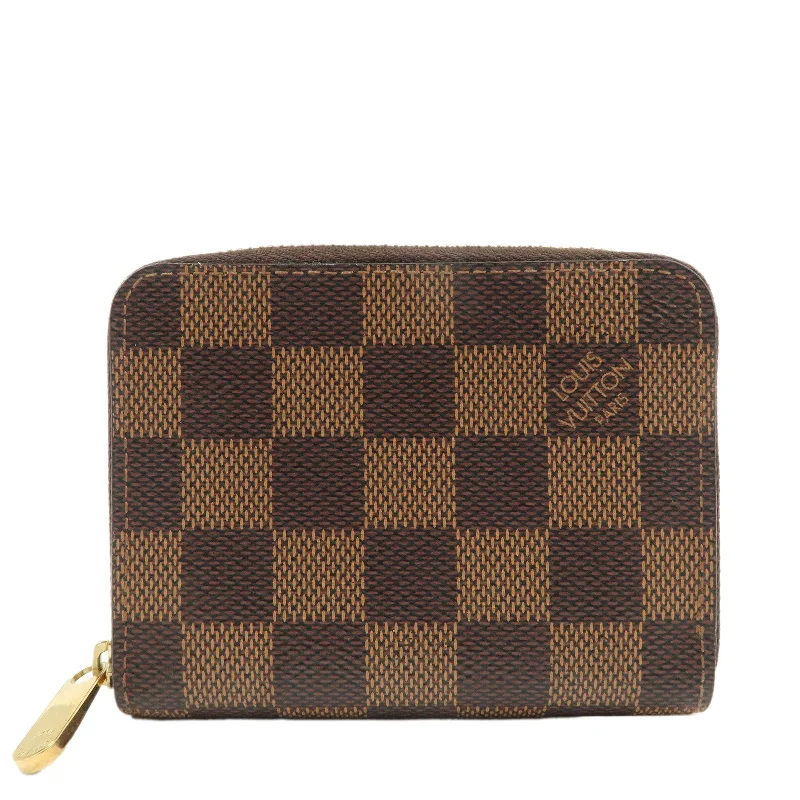 Louis Vuitton Twist bags with a snakeskin - effect panel for a bold lookLouis Vuitton Damier Zippy Coin Purse Coin Case N63070