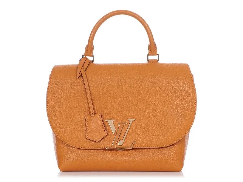 Louis Vuitton tote bags with a spacious interior and multiple pocketsLouis Vuitton Saffron Volta