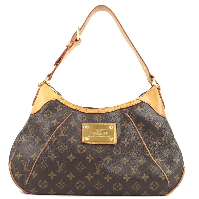 Louis Vuitton tote bags with a printed LV logo on the front for brand visibilityLouis Vuitton Monogram Thames GM Shoulder Bag M56383