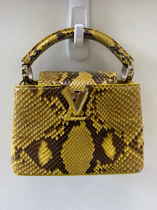 Louis Vuitton Twist bags with a snakeskin - effect panel for a bold lookLOUIS VUITTON PYTHON MINI CAPUCINES BAG