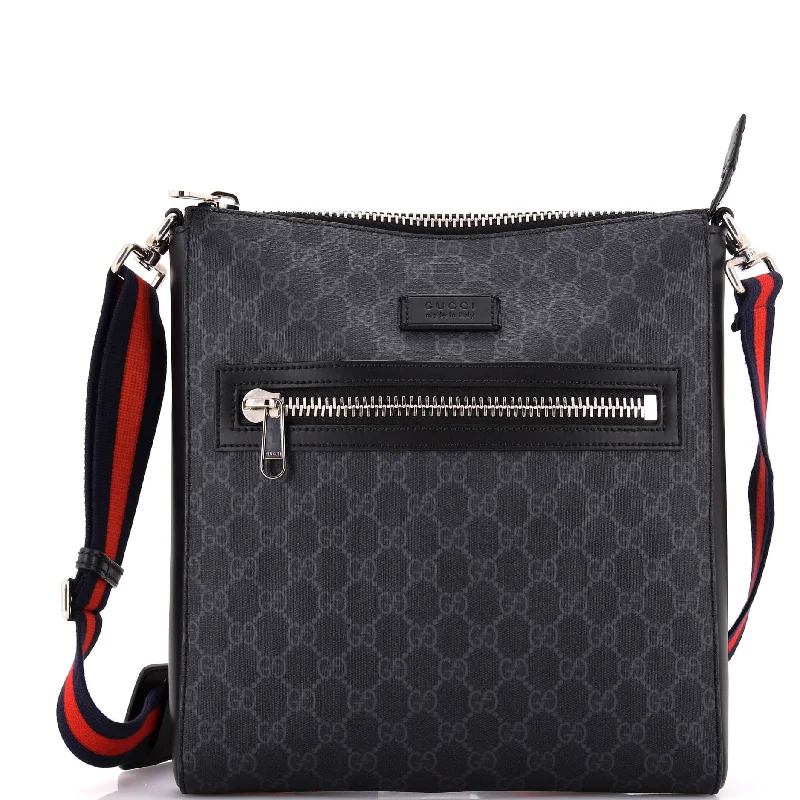 Women Gucci bags with a snap - button closure and a decorative charmWeb Strap Front Zip Messenger Bag GG Coated Canvas Medium