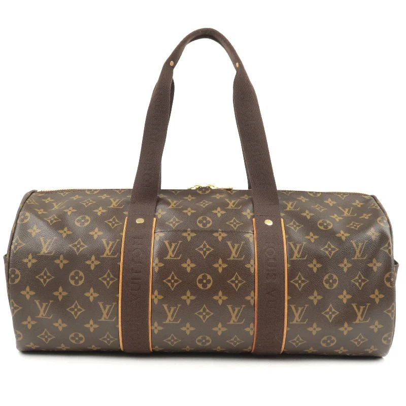 Louis Vuitton Speedy bags in monogram canvas for a classic lookLouis Vuitton Monogram Sporty Beaubourg Duffle Bag M97036