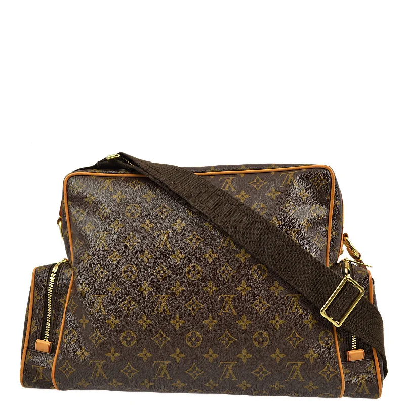 Louis Vuitton Twist bags with a contrast - colored interior for visual interestLouis Vuitton 2003 Monogram Sac Squash Shoulder Bag M92967