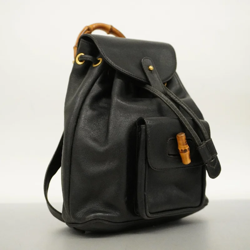 Women Gucci Sylvie bags with a monogram - embossed leatherGucci  Bamboo Rucksack 003 1705 0030 Women's Leather Backpack Black