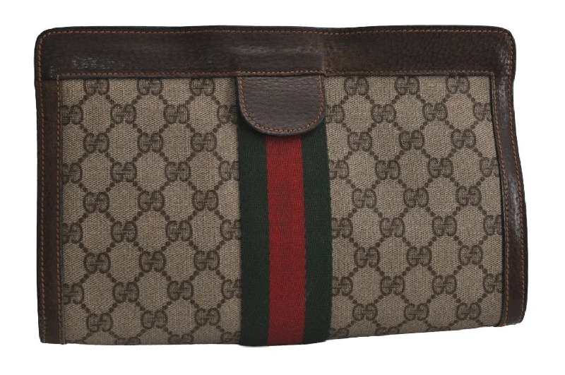 Women Gucci Sylvie bags with a monogram - embossed leatherAuthentic GUCCI Web Sherry Line Clutch Hand Bag Purse GG PVC Leather Brown 7922J