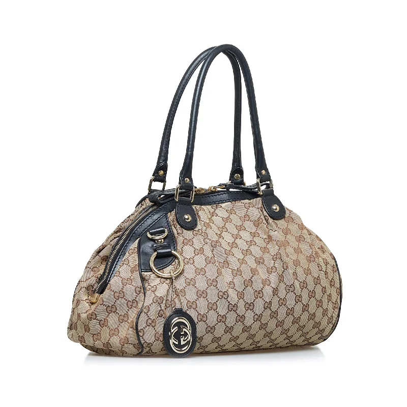 Gucci Marmont bags for women with quilted leather exteriorsGucci GG Canvas Sukey (SHG-PkZOax)