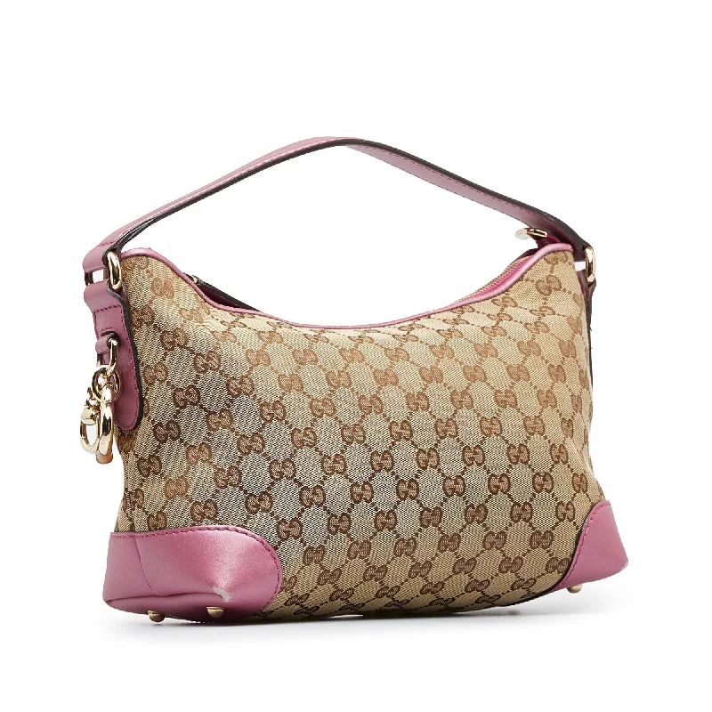 Gucci tote bags for women with a water - resistant coatingGucci GG Canvas Heart Bit Handbag (SHG-6OMg8o)