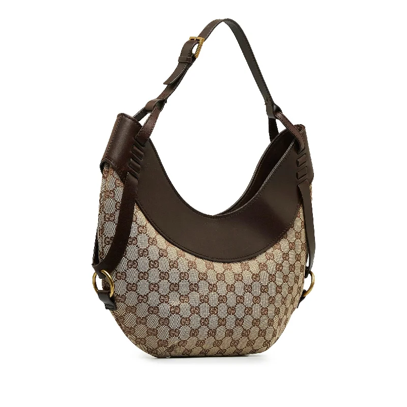 Women Gucci Sylvie bags with a monogram - embossed leatherGucci GG Canvas Hobo Bag (A9kewN)