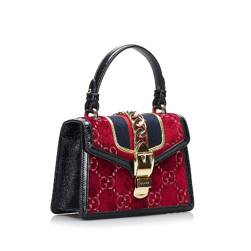 Women Gucci crossbody bags with a woven leather strapGucci Mini GG Velvet Sylvie Satchel (SHG-DMuxoM)