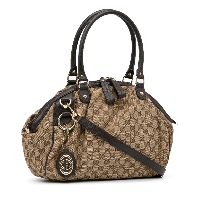 Gucci backpacks for women with a hidden back pocketGucci GG Canvas Sukey Satchel (SHG-OwA3vA)