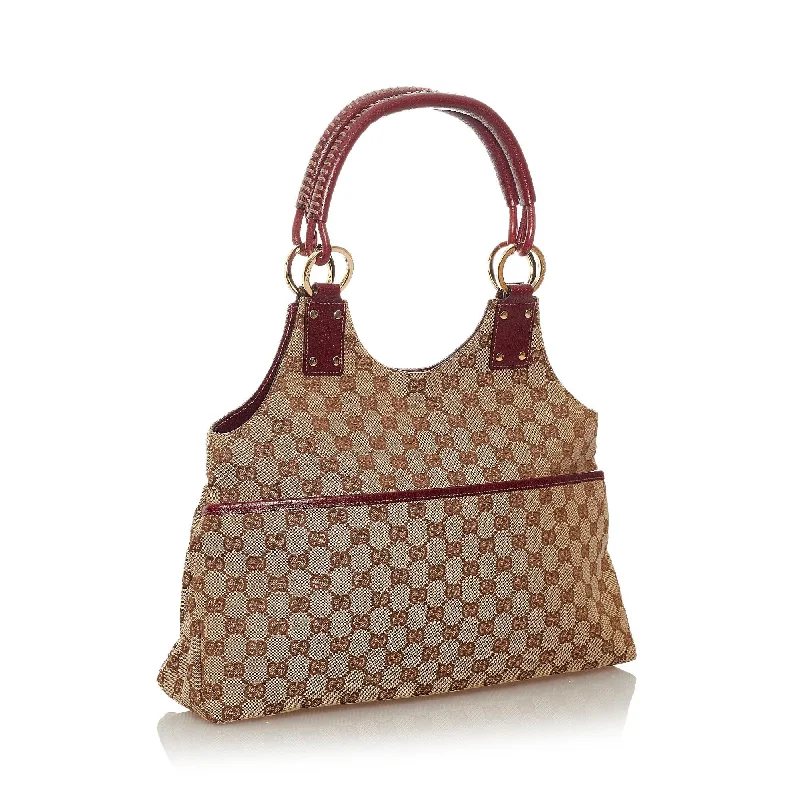 Women Gucci Sylvie bags with a monogram - embossed leatherGucci GG Canvas Handbag (27547)