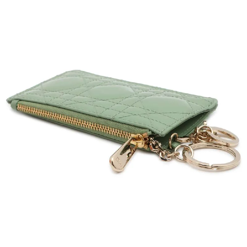 Christian Dior Saddle bags with a studded trim for a bold lookDior Lady Dior Cannage Coin purse Green Patent Leather