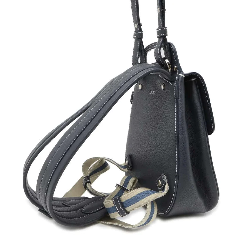 Christian Dior Saddle bags with a studded trim for a bold lookDior Gallop Backpack Navy Leather