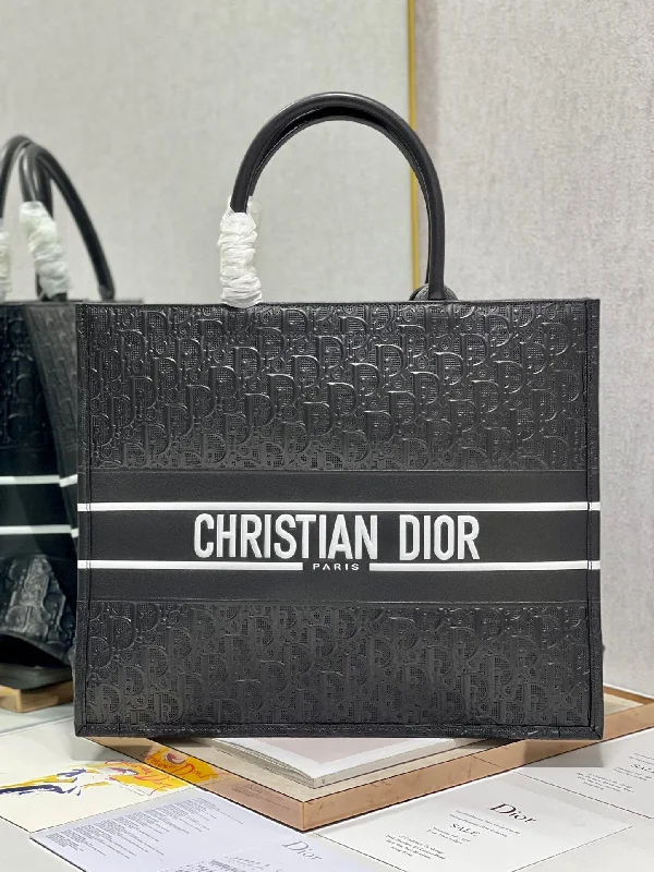 Christian Dior bags with a quilted pattern and gold - toned hardwareChristian Dior Large Book Tote Black Handbags