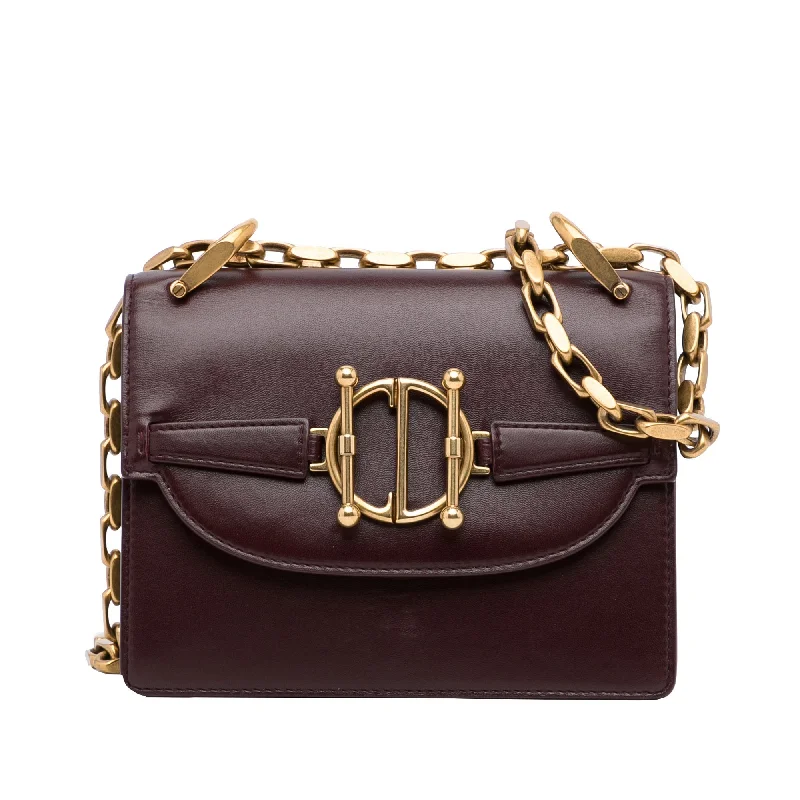 Christian Dior Saddle bags with a patent leather finish for a shiny lookDior Diordirection Burgundy Leather