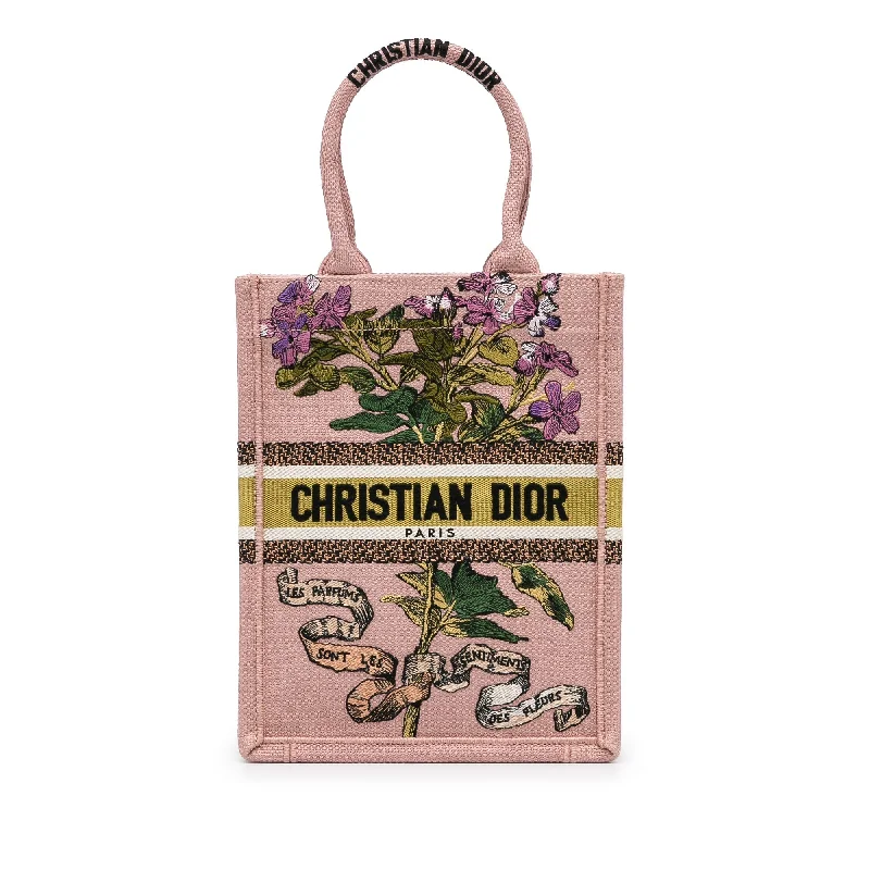 Christian Dior Saddle bags with a patent leather finish for a shiny lookDior Fleurs Bibliques Vertical Book Tote Pink Embroidered Canvas