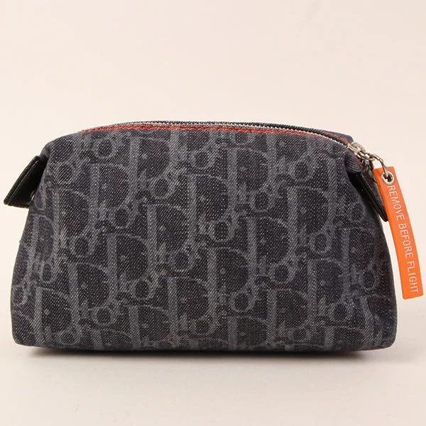 Christian Dior bags with a side - pocket for holding a water bottleDIOR Flightline Denim Trotter Pattern Pouch Indigo/Orange