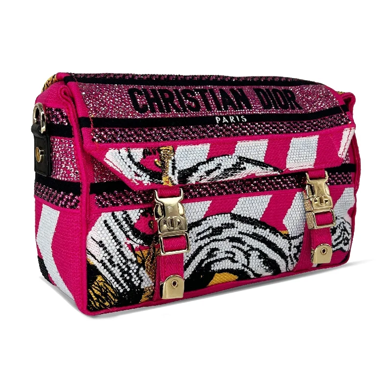 Christian Dior Saddle bags with a studded trim for a bold lookSmall Dior camp bag pink/multicolour technical canvas with strass