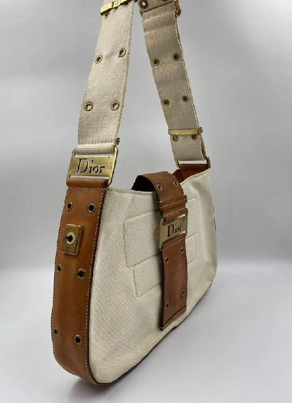 Christian Dior Saddle bags with a studded trim for a bold lookVintage Dior Columbus Bag